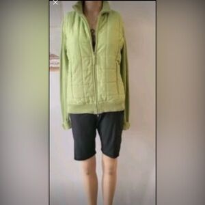 Green Quilted Jacket with Black Shorts